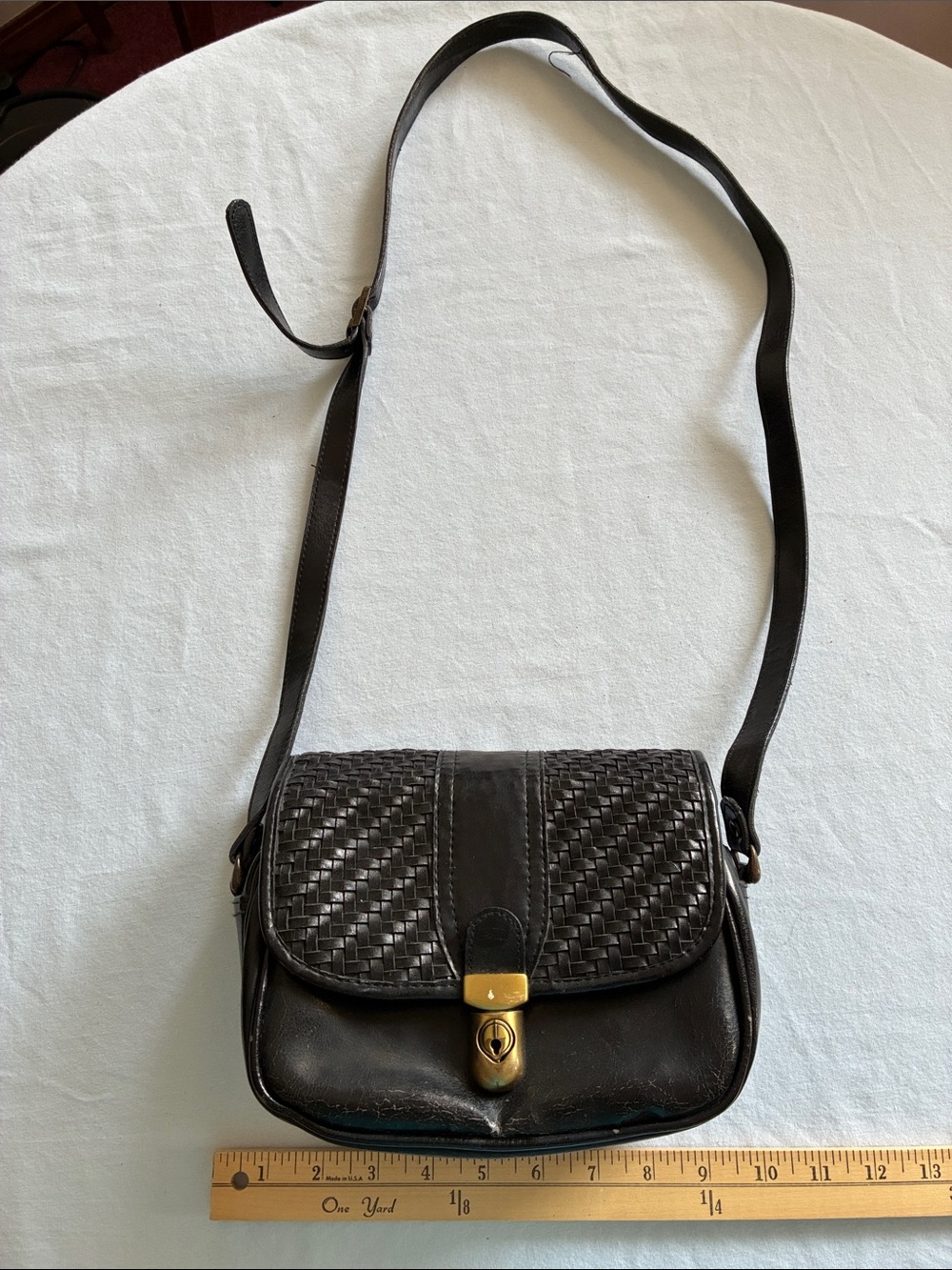 Elka Black Woven Leather Crossbody Bag with Gold-Tone Lock